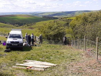The Dorset Midweek volunteers fencing at Hogcliff National Nature Reserve